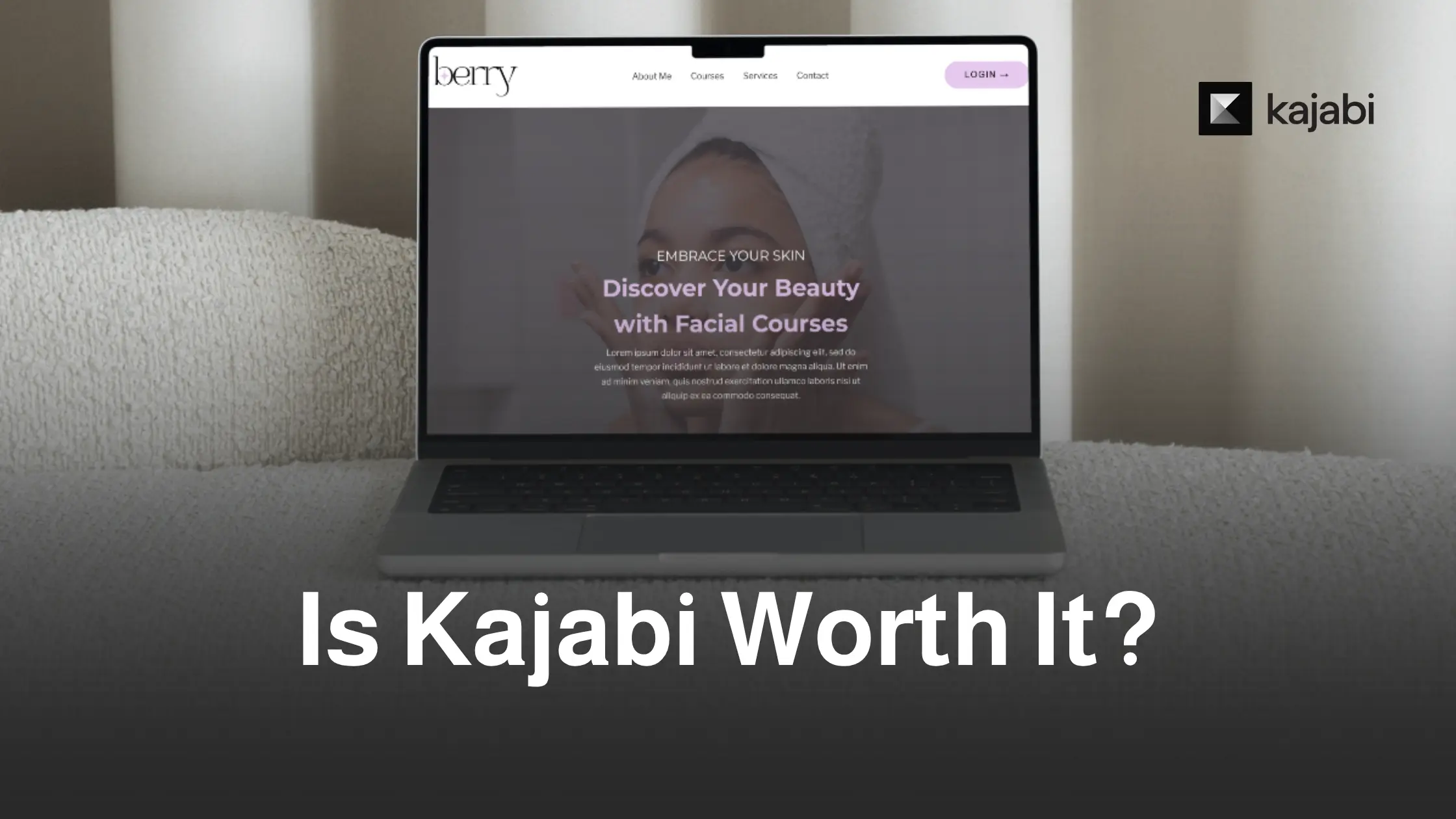 Clean flat lay of a laptop showing a Kajabi dashboard, with minimal modern desk setup